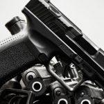 handgun on the white background