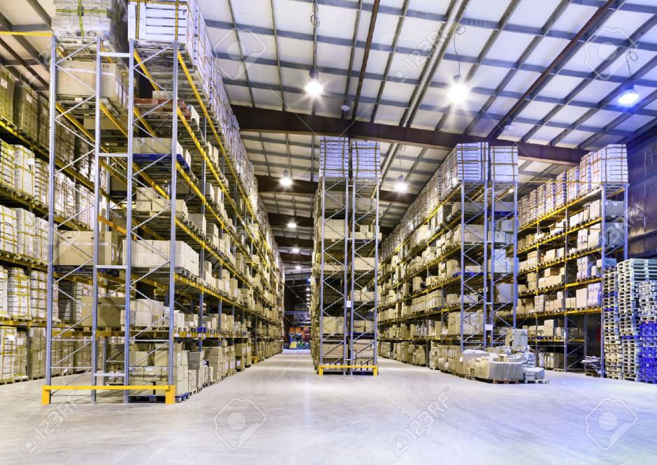 24209298 Inter of new large and modern warehouse space Stock Photo warehouse factory industrial 940x6661 1