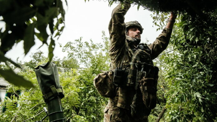 Ukrainian sevicemen hold their positions in the Donetsk region