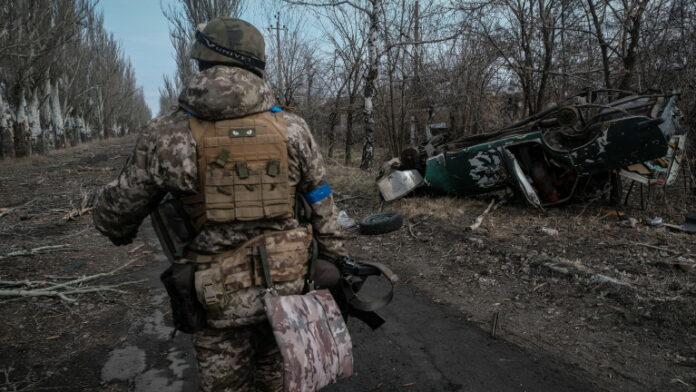 Ukrianian soldiers patrol devastated town of Velyka Novosilka