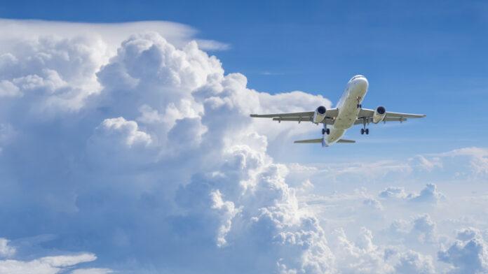 Airplane flying under blue sky 8