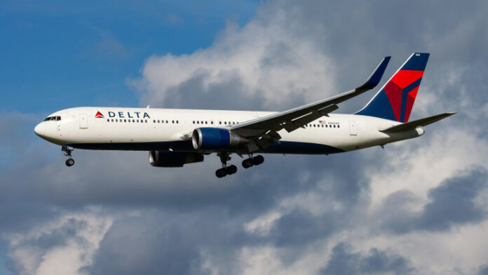 Delta Airlines passenger plane at airport Schedule flight travel Aviation and aircraft Air transport Global international transportation Fly and flying
