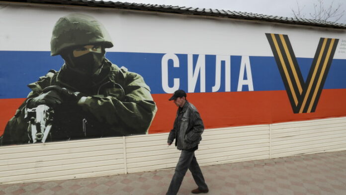 A Russian court holds hearing over parental rights of a girl who drew anti war picture